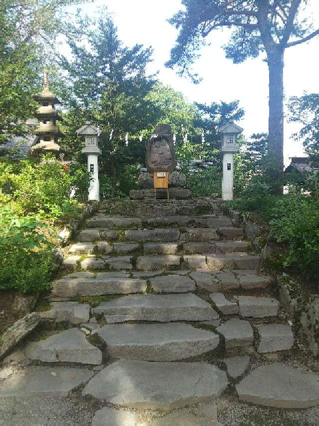 大雪夫婦道祖神（比布神社境内社）の写真1